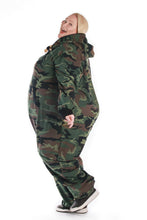 Load image into Gallery viewer, Sofa Killer women plus size adult onesie with camouflage pattern CAMO, captured in a playful side pose highlighting its comfortable fit and flexible material.