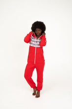 Load image into Gallery viewer, Sofa Killer red onesie with Nordic applications displayed by a woman striking a playful pose, highlighting its cozy fit and stylish pockets.