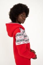 Load image into Gallery viewer, Sofa Killer red onesie with Nordic applications modeled by a woman, showcasing the unique hoodie design and vibrant colors.