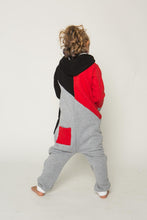 Load image into Gallery viewer, Sofa Killer tricolor unisex kids onesie Racing, showcasing the back view with red, black, and light grey colors. Child model stands with hands on hips, highlighting the stylish red pocket and cozy design.
