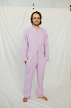 Load image into Gallery viewer, Man wearing Sofa Killer violet color linen onesie, standing against a white backdrop with arms relaxed at sides. Perfect for summer outings.
