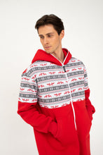 Load image into Gallery viewer, Stylish shot of a model in a Sofa Killer red onesie with Nordic applications, looking to the side, showcasing the unique design and comfort of the outfit.
