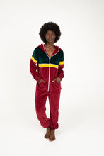 Load image into Gallery viewer, Sofa Killer women velour onesie California in bordo and green color, model posing with hands in pockets.
