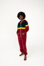 Load image into Gallery viewer, Full-body shot of Sofa Killer women velour onesie California, model standing confidently with hands in pockets.
